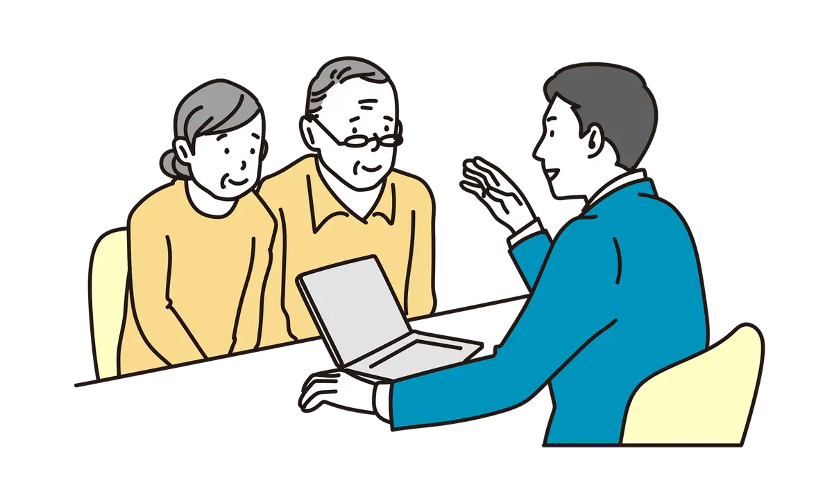 不動産売却の流れを担当者から説明を受けるご夫婦